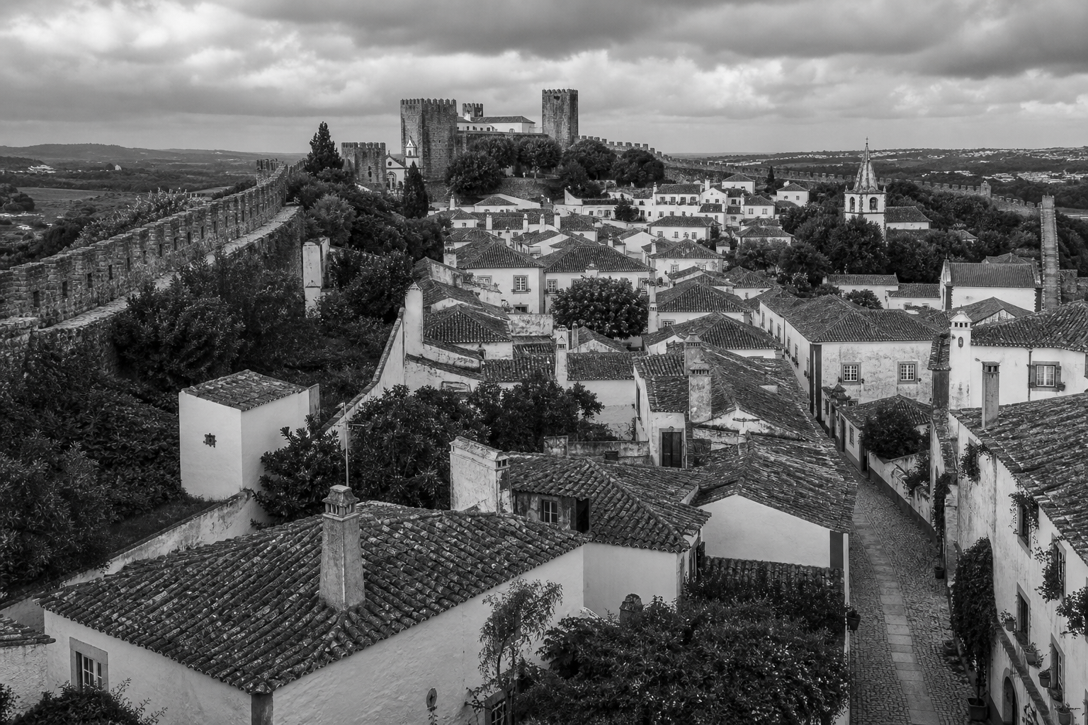 Black and white Obidos Portugal historic cityscape for private investigator services in Obidos